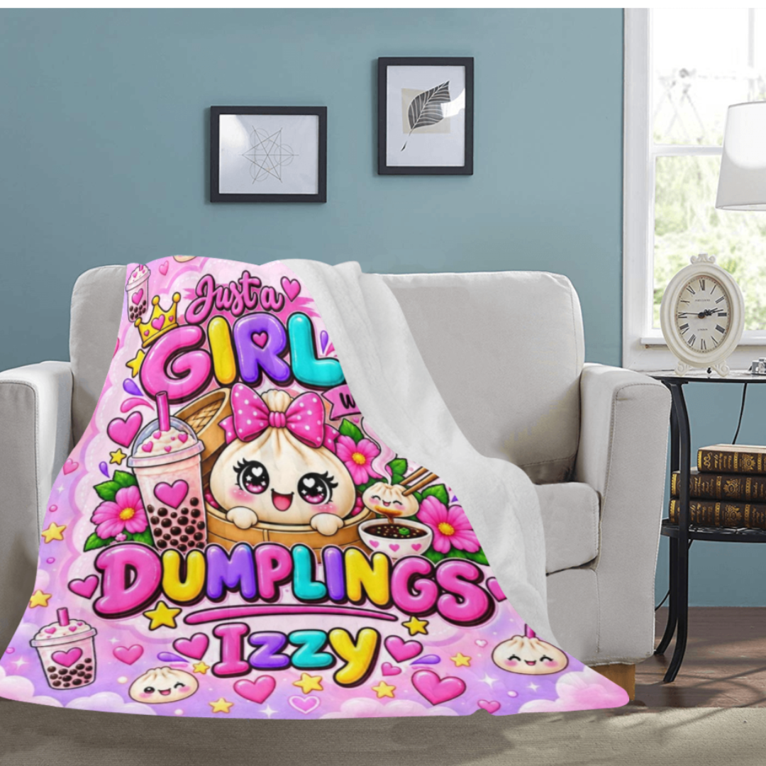 Custom name blanket with dumpling design on a living room couch